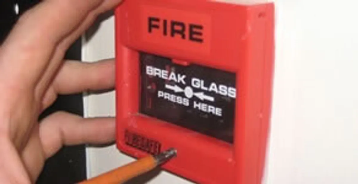 fire alarm installation service showing manual fire alarm pull station installed by licensed electricians in Bradenton, FL