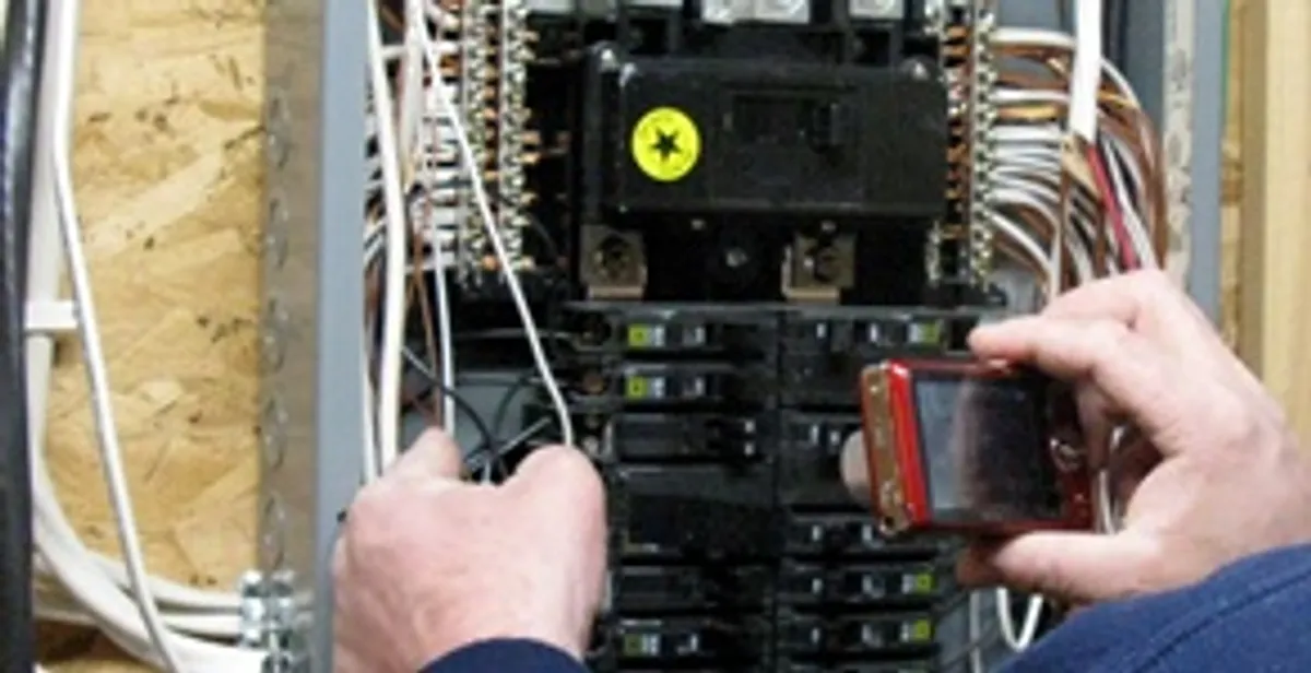 Home electrical inspection of circuit breaker panel by licensed electrician in Bradenton, FL