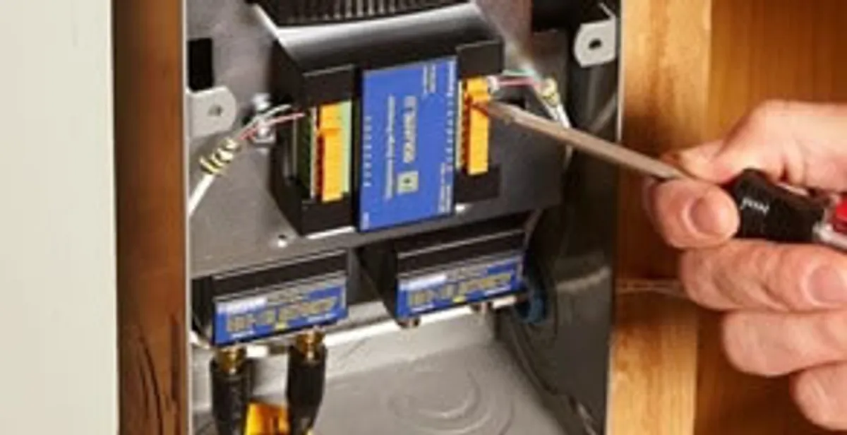 Whole home surge protection device being installed by a licensed electrician to protect electrical systems in Bradenton, FL